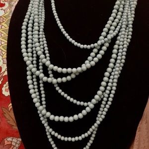 Multi layer turquoise statement necklace.